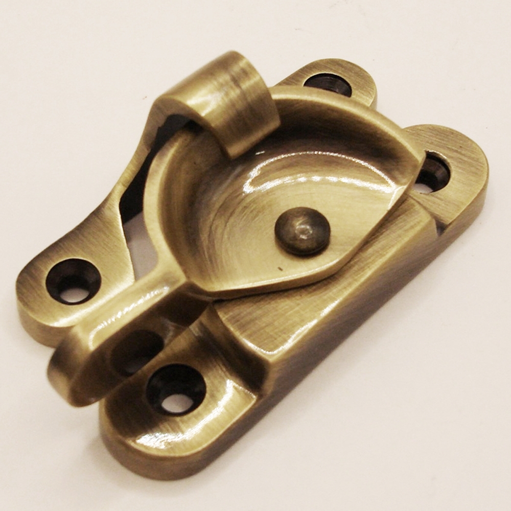 TWC002/AB • Non-Locking • Antique Brass • Forged Fitch Sash Fastener